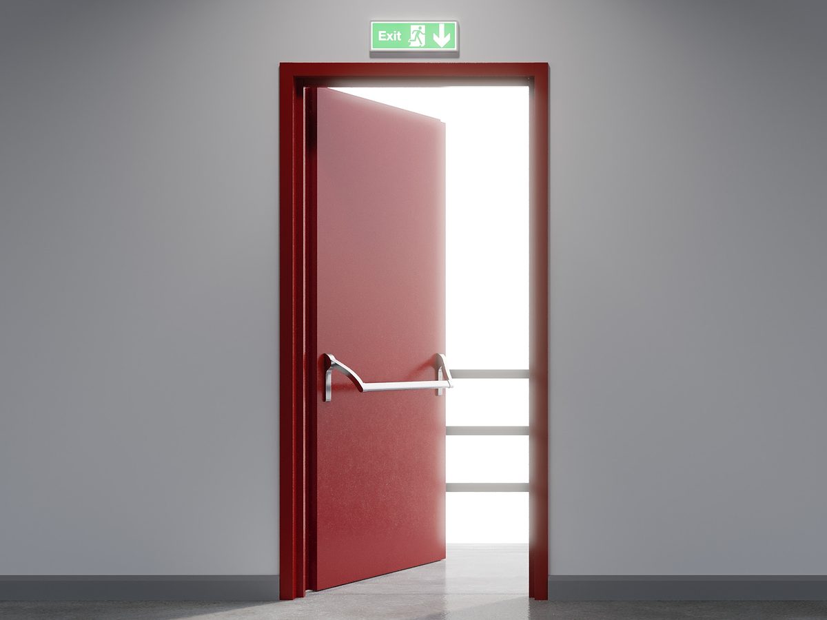 Red fire exit door with panic bar